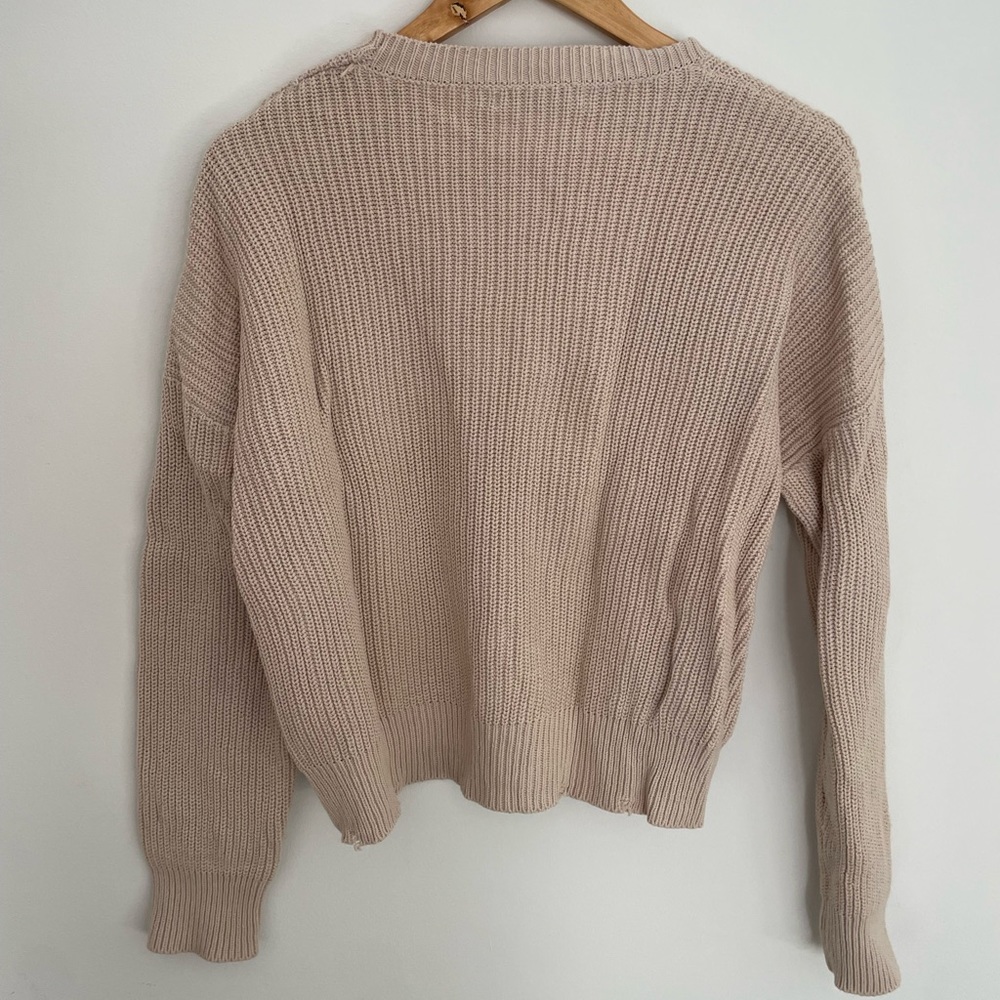 Distressed knit sweater